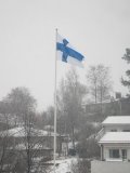 Finnische Flagge im Schnee Finnische Flagge im Schnee